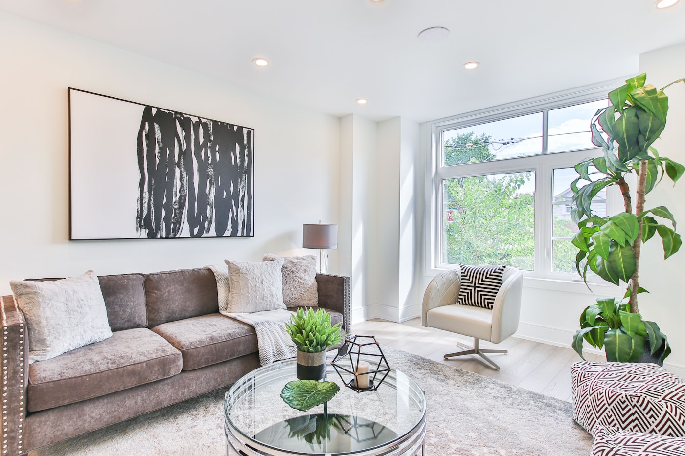 Bright, professionally staged serviced apartment living room — example placeholder image